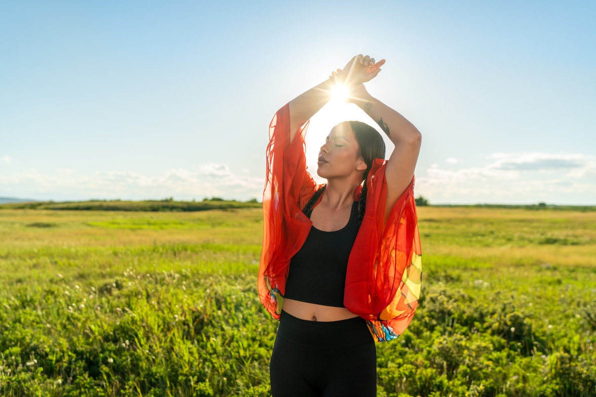 Indigenous woman on Nose Hill Park in Calgary, AB